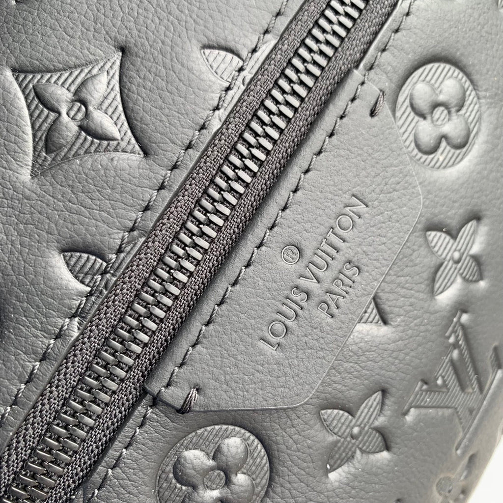 DISCOVERY PM BACKPACK 38 IN BLACK MONOGRAM LAMBSKIN