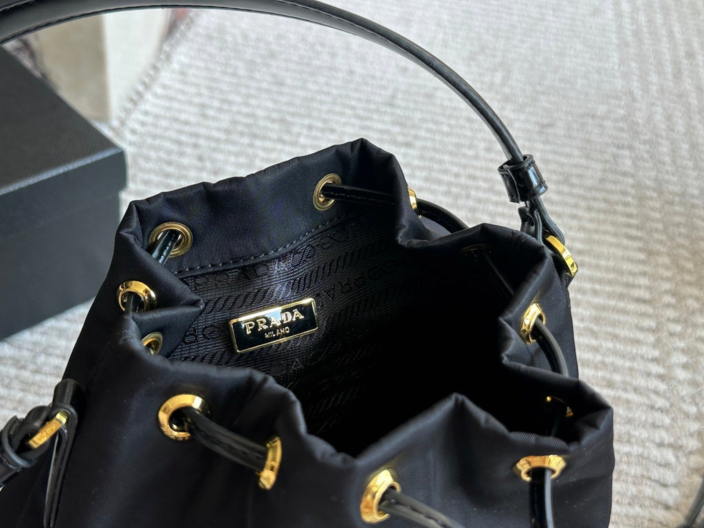 DRAWSTRING HOBO BAG 21 IN BLACK RE-NYLON AND CALFSKIN HANDLE