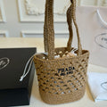 CROCHET BUCKET BAG 32 IN BROWN WOVEN RAFFIA EMBROIDED LOGO