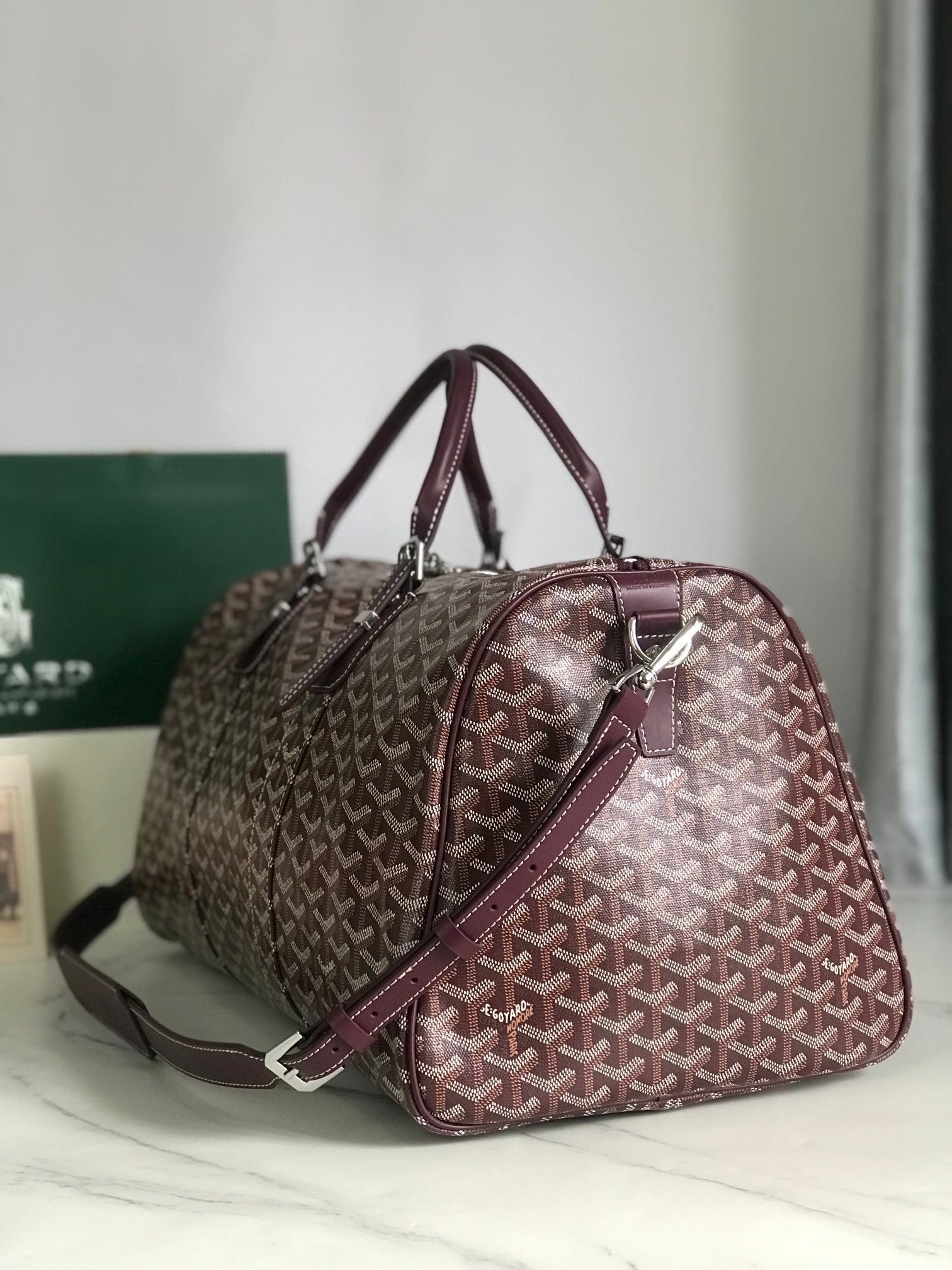 BOSTON 50 BAG IN WINE RED GOYARDINE CANVAS AND CALFSKIN TRIM