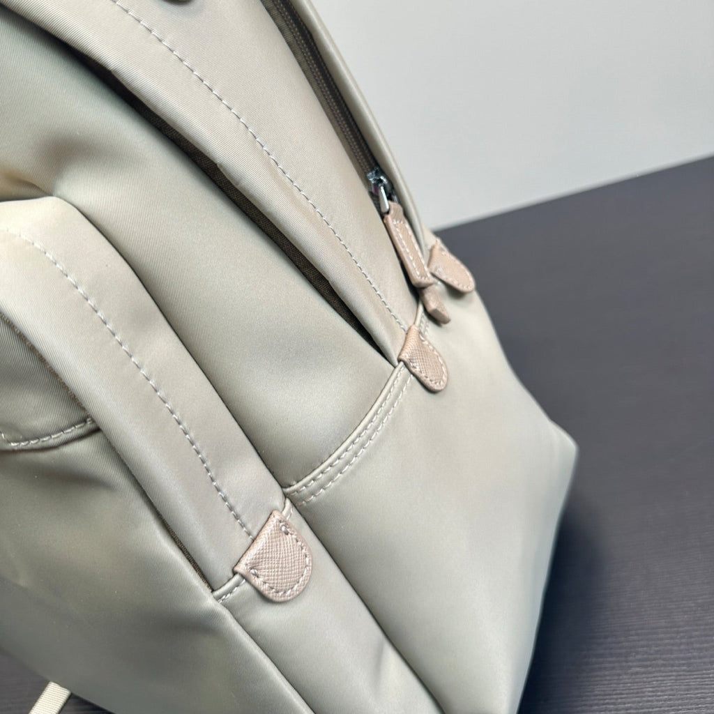 FRONT ZIP POCKET BACKPACK 40 IN BEIGE RE-NYLON